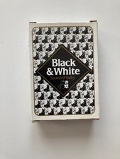 Black & White whisky playing