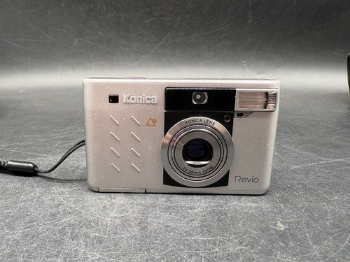Konica revio point shoot - &,