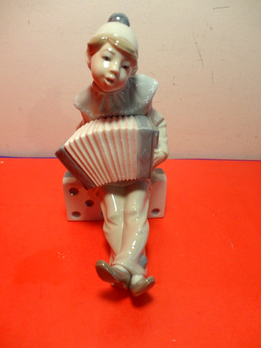 Lladro clown playing accordion - clown,