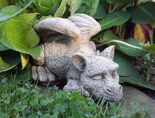 Stone garden snoozing baby - garden,