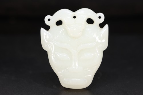 Jade carved beast face - beast, pattern