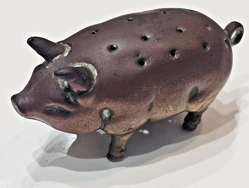 Antique brass perforated pig - brass,