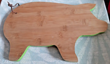 Pig shaped Bamboo chopping/cutting board edged in green with hanging strap