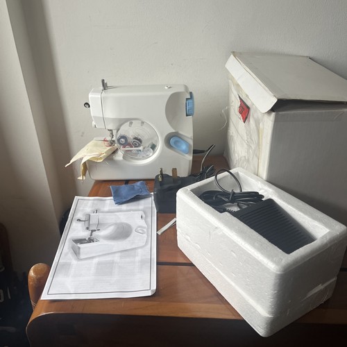 Portable sewing machine - portable,