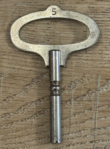 Vintage chrome clock - chrome, key