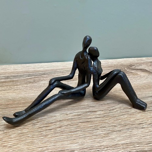 Metal couple sitting sculpture - metal,
