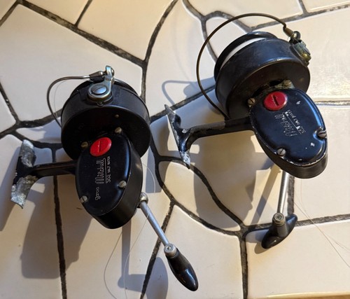 Two vintage mitchell 302 - two,