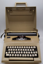 SCM Smith Corona Courier Portable Typewriter w/ Case. Untested, sold as seen.