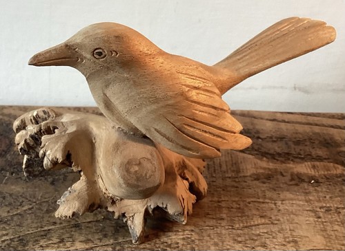 Hand carved bird - on, driftwood