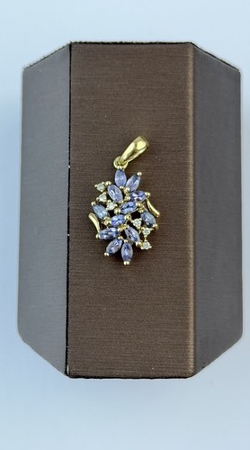 Tanzanite and diamond 9ct gold - and,