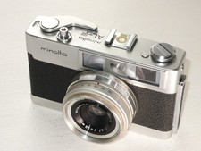 MINOLTA AL-F 35mm RANGEFINDER COMPACT CAMERA. NEW SEALS . TESTED.  LENS CAP.