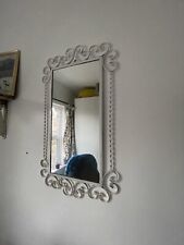 Vintage 1960s  metal wall mirror white swirling pattern surround