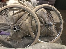 PAIR OF silver cross coach pram wheels and tyres 14 inch 300  great condition