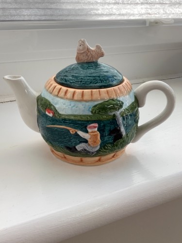 Novelty green teapot embossed