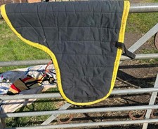 poly pad, full size black and yellow, good condition needs a wash 