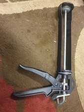 HEAVY DUTY REVOLVING SILICONE CAULKING GUN