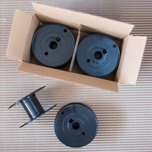 Empty plastic spools - 8,
