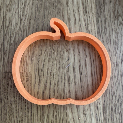 Orange plastic pumpkin cookie - pumpkin,