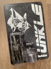 Unkle 77 Silver Figure Super7
