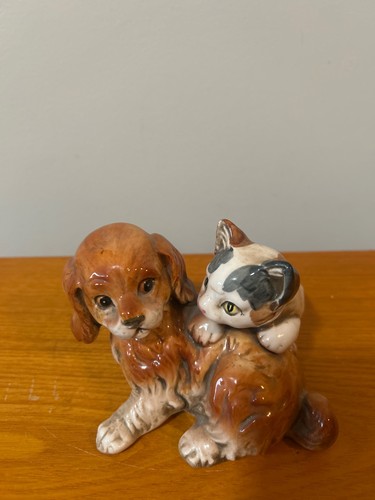 Enesco figurine depicts - , a