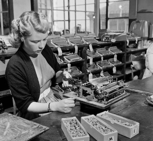 Lady making parts - a,