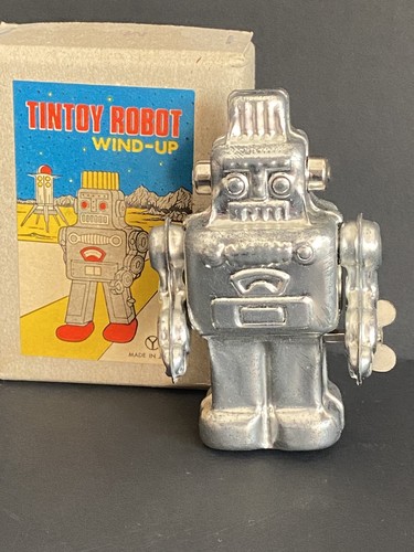 Vintage tin toy wind - tin, silver