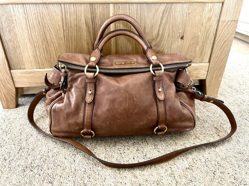 100 authentic miu - 100%,