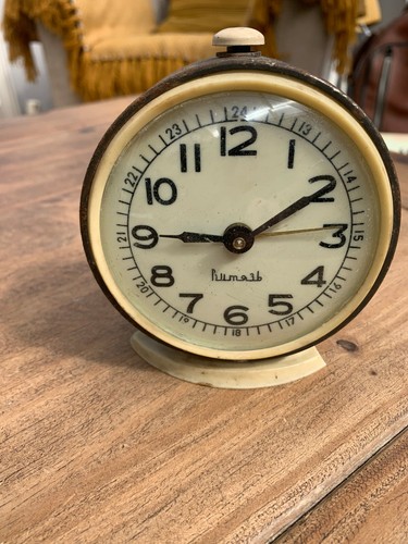 Unusual metal cased mantel - unusual,