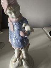 Neo Ladro blue and white boy feeding the birds  