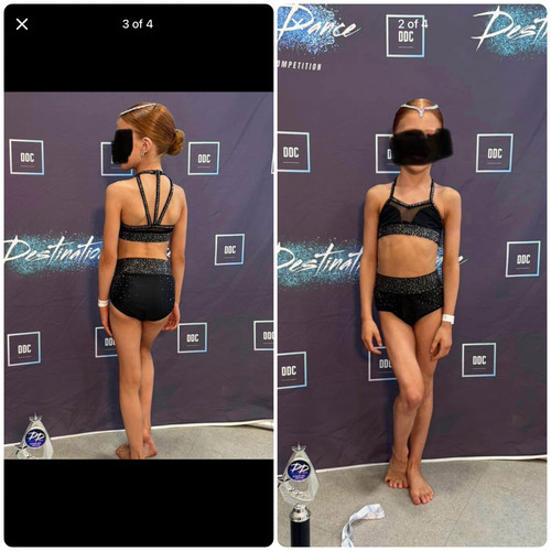 Black dance costume heavily