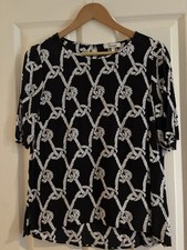 Black Top With White Knot