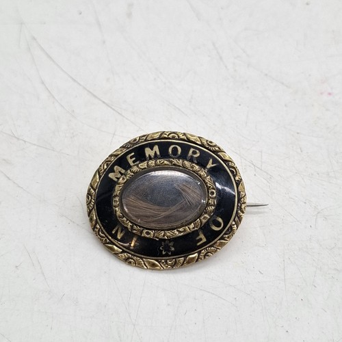 Large gold tone hair lock - large,