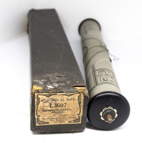 Vintage player piano roll con - player, 'con
