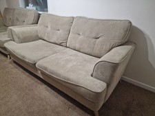 Couch is Sofa In a Beige Or