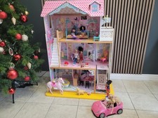 KidKraft 3 Storey Annabelle Wooden Dolls House with Some Furniture Included