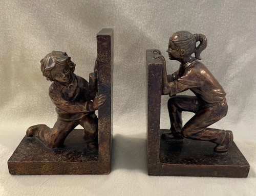 Bookends girl and - boy, playing