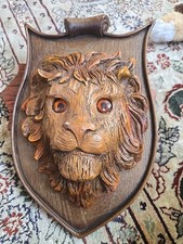 Lion head wood carving for