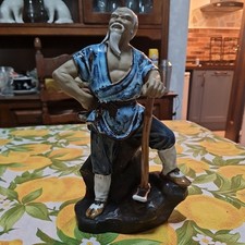 Vintage Shiwan Chinese mud man Figurine holding an axe. 25cm high