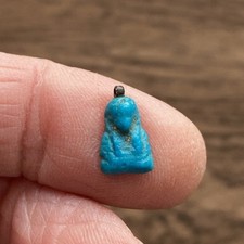 ANCIENT EGYPTIAN. FAIENCE AMULET OF A MUMMY BUST. (CIRCA 1550-1069 B.C).