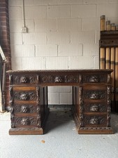 A 19th Century Carved Oak Flemish Style, Green Man Partners Desk, 122cm C1880