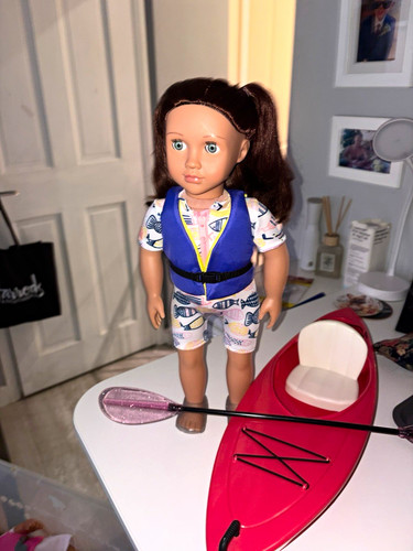 Doll with her - , kayak