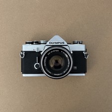 Olympus OM-1 35mm SLR Film Camera with Olympus Zuiko 50mm f/1.8 "Silver Nose"