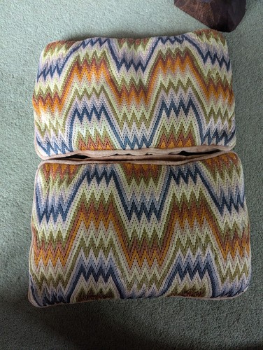 Two vintage small cushions