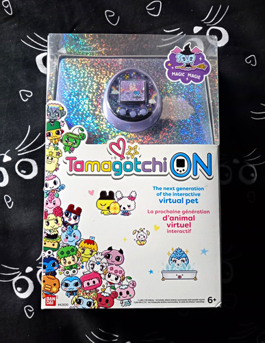 Tamagotchi purple boxed - tamagotchi, boxed.