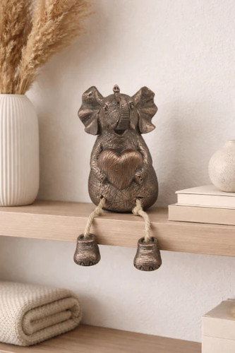 Tuskers bronze sitting - tuskers,,