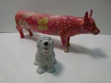 A STAFFORDSHIRE DOG MONEY BOX