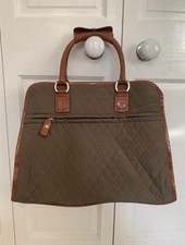 Khaki green Liz Claiborne carry on bag. Quilted With Leather Trims