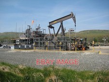 PHOTO  KIMMERIDGE OIL WELL THIS 'NODDING DONKEY' IS PUMPING OIL AT THE KIMMERIDG