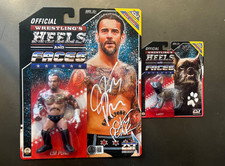 WWE CM Punk Signed Heels and Faces Figure + Larry  with Beckett Sticker & Proof