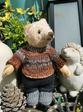 Hand knitted teddy bear
